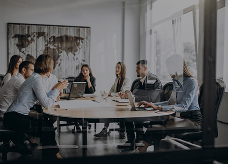 Group of people working out business plan in an office